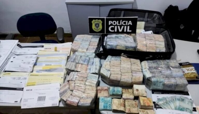 Mulher é presa com cerca de R$ 200 mil em mala, suspeita de lavagem de dinheiro